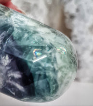 Load image into Gallery viewer, Feather Fluorite Palmstone with Rainbows