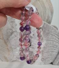 Load image into Gallery viewer, Super Seven Strawberry Quartz Bracelet