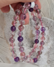 Load image into Gallery viewer, Super Seven Strawberry Quartz Bracelet