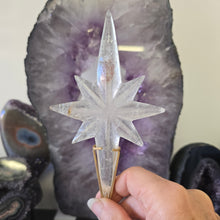 Load image into Gallery viewer, Clear Quartz Polaris Star on stand.
