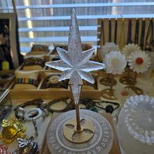 Load image into Gallery viewer, Clear Quartz Polaris Star on stand.
