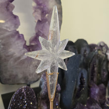Load image into Gallery viewer, Clear Quartz Polaris Star on stand.
