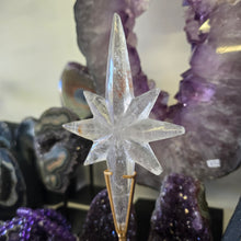 Load image into Gallery viewer, Clear Quartz Polaris Star on stand.
