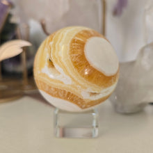 Load image into Gallery viewer, Orange Calcite Sphere
