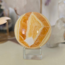 Load image into Gallery viewer, Orange Calcite Sphere
