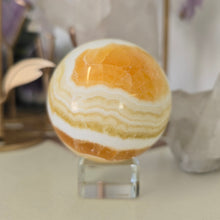 Load image into Gallery viewer, Orange Calcite Sphere
