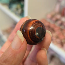 Load image into Gallery viewer, Red Tiger&#39;s Eye Sphere
