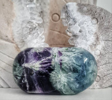 Load image into Gallery viewer, Feather Fluorite Palmstone with Rainbows
