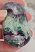 Load image into Gallery viewer, Feather Fluorite Palmstone with Rainbows
